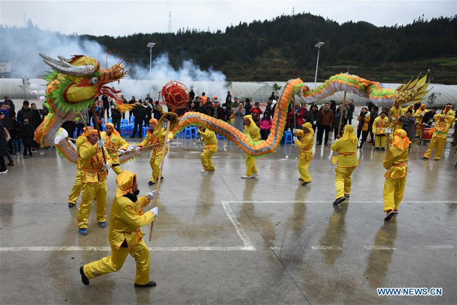 People of Dong ethnic group perform dragon dance at Jiasuo Dong Village of Zhongchao Township in Liping County, southwest China\'s Guizhou Province, Dec. 9, 2018. Dong people celebrated the new year through various activities on Dec. 7-9. (Xinhua/Yang Wenbin)