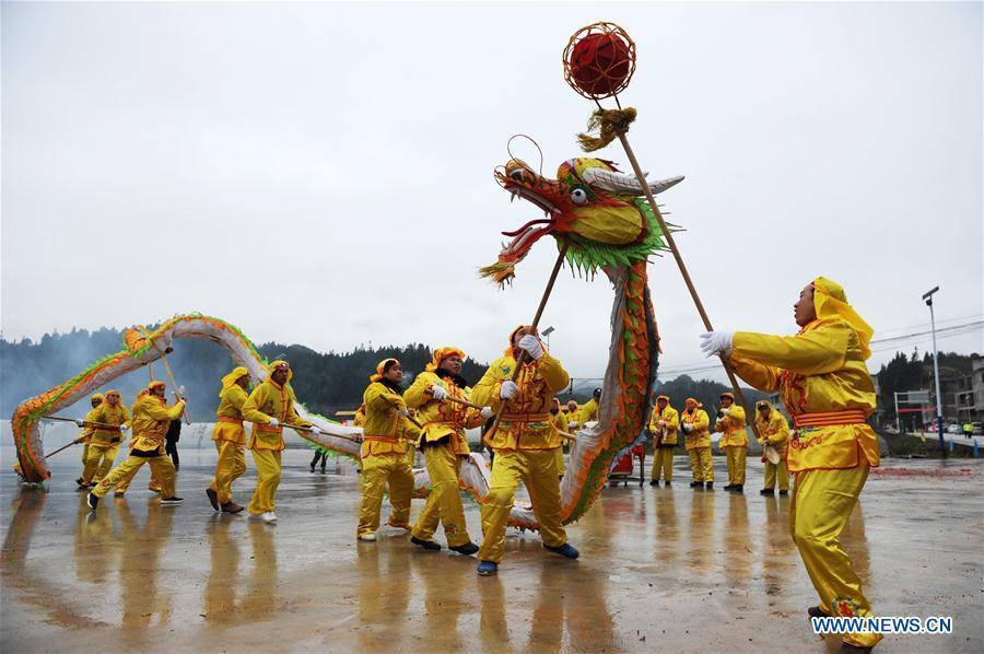 People of Dong ethnic group perform dragon dance at Jiasuo Dong Village of Zhongchao Township in Liping County, southwest China\'s Guizhou Province, Dec. 9, 2018. Dong people celebrated the new year through various activities on Dec. 7-9. (Xinhua/Yang Wenbin)