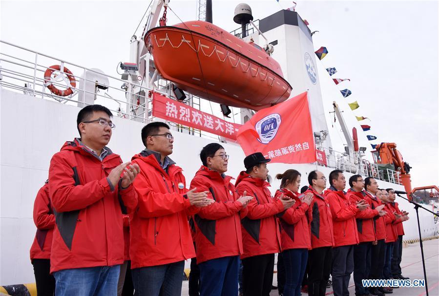Research team members are seen off by relatives and friends as they depart for the expedition mission on research vessel Dayang Yihao (Ocean No. 1) in Qingdao, east China\'s Shandong Province, Dec. 10, 2018. The vessel departed for a new 230-day scientific ocean expedition. (Xinhua/Li Ziheng)