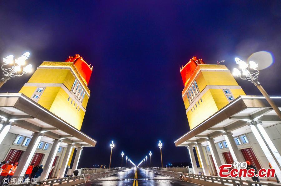 The lighting show at the Nanjing Yangtze River Bridge under renovation in Nanjing City, Jiangsu Province. Renovation of the landmark 50-year-old bridge, which was the first ever Chinese-designed bridge constructed across the Yangtze, is expected to be completed by the end of 2018. The new lighting system is more bright, intelligent and energy-saving, said local authorities. (Photo/VCG)
