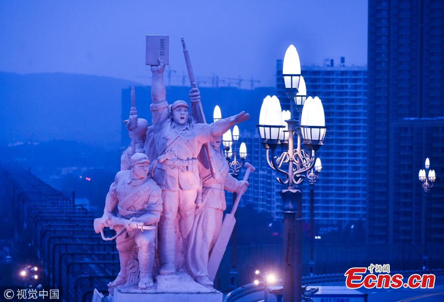 The lighting show at the Nanjing Yangtze River Bridge under renovation in Nanjing City, Jiangsu Province. Renovation of the landmark 50-year-old bridge, which was the first ever Chinese-designed bridge constructed across the Yangtze, is expected to be completed by the end of 2018. The new lighting system is more bright, intelligent and energy-saving, said local authorities. (Photo/VCG)