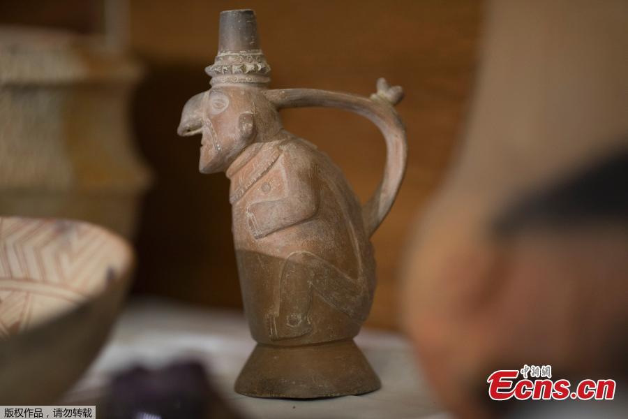 A Peruvian anthropomorphic ceramic rescued from the ashes of the fire that swept through Rio’s National Museum in September, is displayed during a media presentation, in Rio de Janeiro, Brazil, Dec. 10, 2018. The director of the National Museum and the German consul hosted the press conference to announce their partnership for the reconstruction of the museum. (Photo/Agencies)