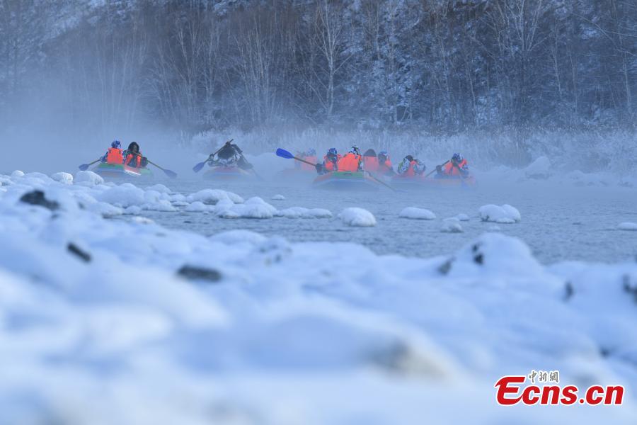 Hardy adventurers raft on a river nicknamed the \