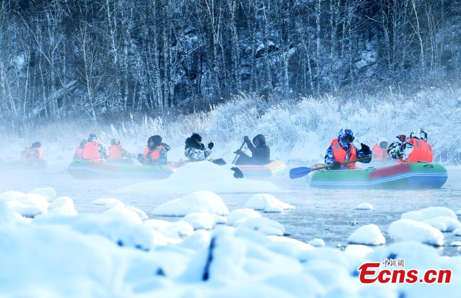 Hardy adventurers raft on a river nicknamed the \