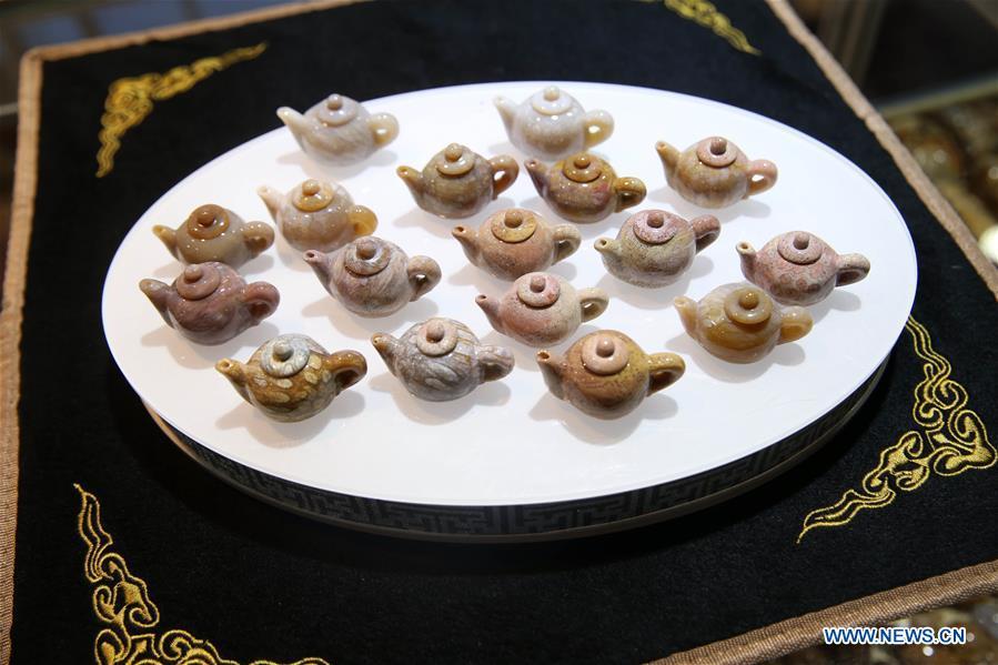 Photo taken on Dec. 13, 2018 shows exhibits showcased at the 2018 China International Jewelry Fair in Beijing, capital of China. Exhibitors from 23 countries and regions attended the fair, opened on Thursday. (Xinhua/Chen Xiaogen)