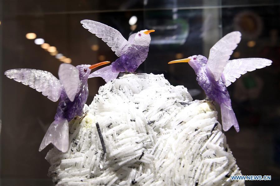 Photo taken on Dec. 13, 2018 shows exhibits showcased at the 2018 China International Jewelry Fair in Beijing, capital of China. Exhibitors from 23 countries and regions attended the fair, opened on Thursday. (Xinhua/Chen Xiaogen)