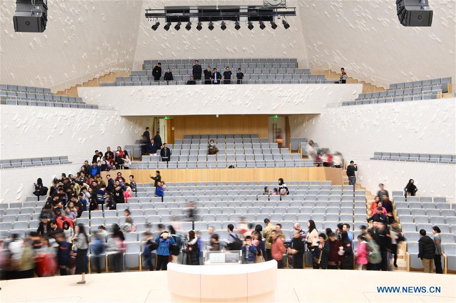 Citizens visit the concert hall of the Fuzhou Strait Cultural Art Center in Fuzhou, southeast China\'s Fujian Province, Dec. 16, 2018. The center held open day activities on Sunday. (Xinhua/Jiang Kehong)