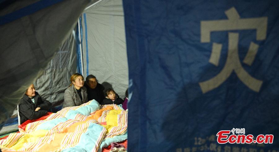 People affected by an earthquake stay at a temporary shelter in Xingwen County, Southwest China’s Sichuan Province, Dec. 17, 2018. A magnitude 5.7 earthquake jolted the county Sunday. As at 5:30 p.m. Sunday, 16 people had been reported injured in the earthquake. (Photo: China News Service/Liu Zhongjun)