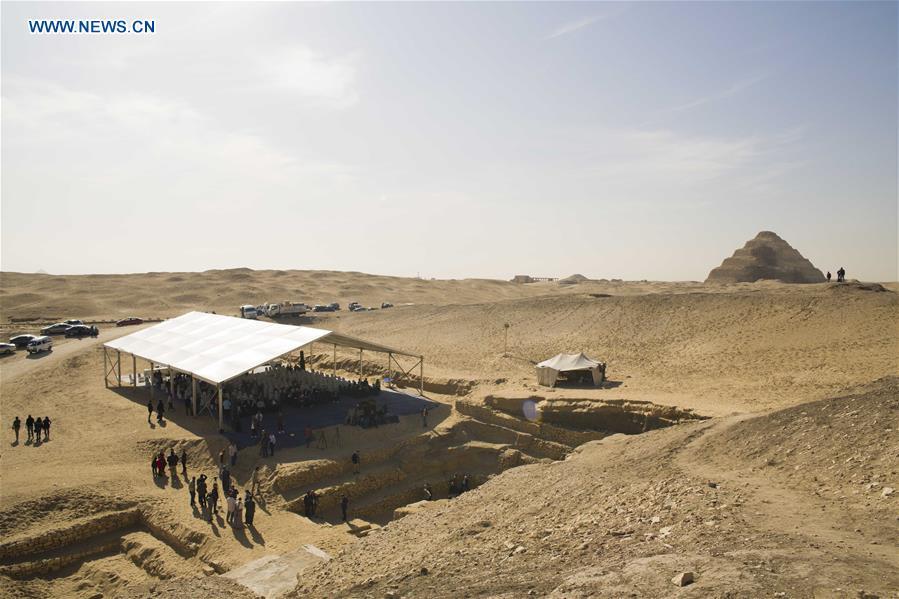 Photo taken on Dec. 15, 2018 shows the site of a press conference near a tomb in Saqqara Necropolis in Giza, Egypt. Egyptian Antiquities Minister Khaled al-Anany announced Saturday the discovery of an \