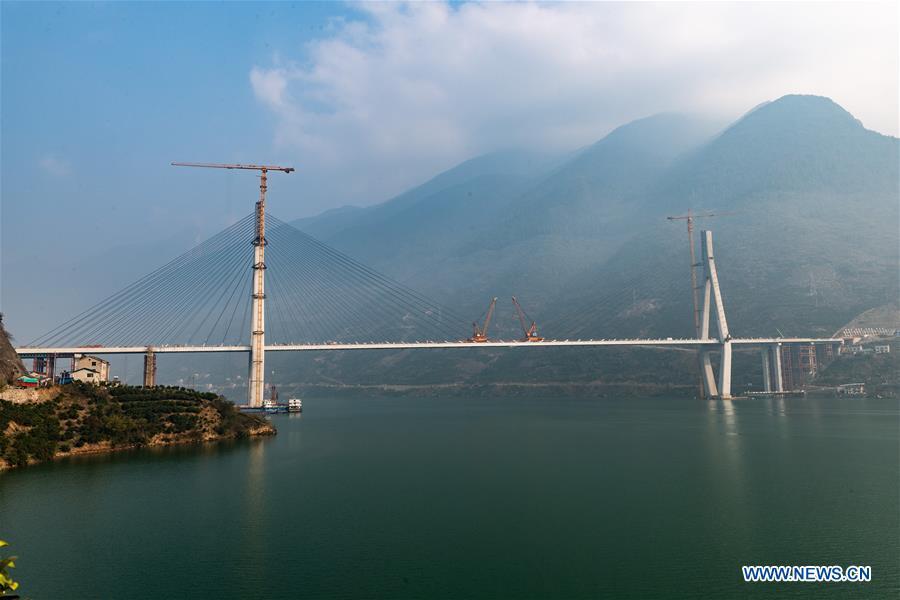Photo taken on Dec. 16, 2018 shows the Xiangxi River Bridge in Zigui County of Yichang City, central China\'s Hubei Province. The closure of the bridge with a 470-meter main span was finished on Sunday. (Xinhua/Zheng Jiayu)