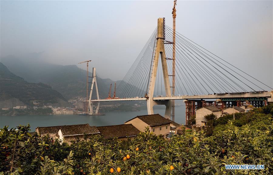 Photo taken on Dec. 16, 2018 shows the Xiangxi River Bridge in Zigui County of Yichang City, central China\'s Hubei Province. The closure of the bridge with a 470-meter main span was finished on Sunday. (Xinhua/Zheng Jiayu)