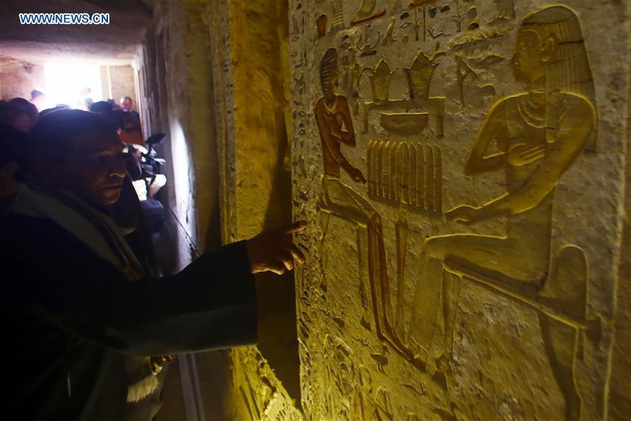 People visit a tomb in Saqqara Necropolis in Giza, Egypt, Dec. 15, 2018. Egyptian Antiquities Minister Khaled al-Anany announced Saturday the discovery of an \
