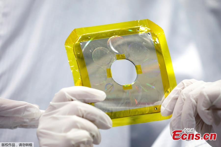 A time capsule, intended to travel to the moon with an unmanned spacecraft in early 2019, is seen during a presentation to the media by members of Israeli non-profit group SpaceIL and representatives from Israel Aerospace Industries (IAI), at the clean room of IAI\'s space division in Yehud, Israel, Dec. 17, 2018. (Photo/Agencies)