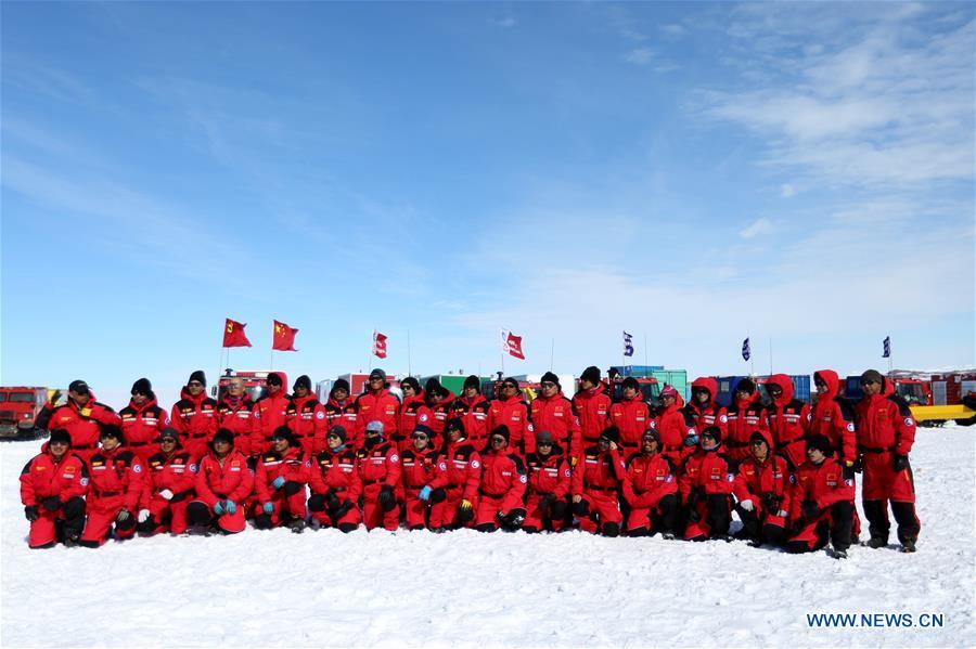 Thirty-seven Chinese researchers pose for photos before departing for China\'s Kunlun and Taishan stations in Antarctica Dec. 18, 2018. China\'s 35th Antarctic expedition on Tuesday sent 37 members of two inland expedition teams to the Kunlun and Taishan stations. (Xinhua/Liu Shiping)