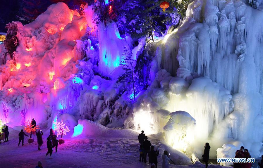 Tourists admire icicles at Dadunxia scenic spot in Linxia Hui Autonomous Prefecture, northwest China\'s Gansu Province, Dec. 16, 2018. (Xinhua/Shi Youdong)