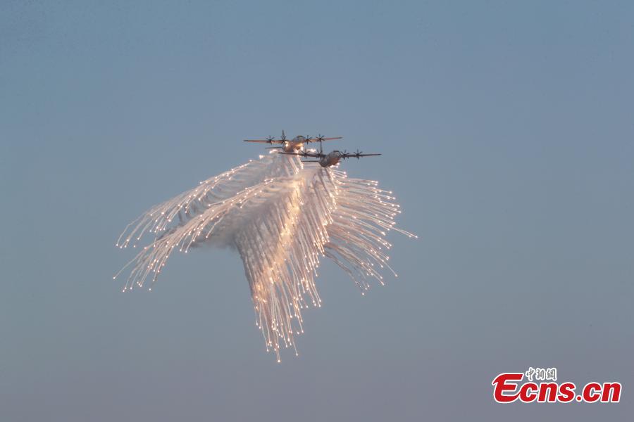 Military aircrafts take part in Qatar\'s National Day celebrations in Doha, Qatar, Dec. 18, 2018. (Photo/Agencies)