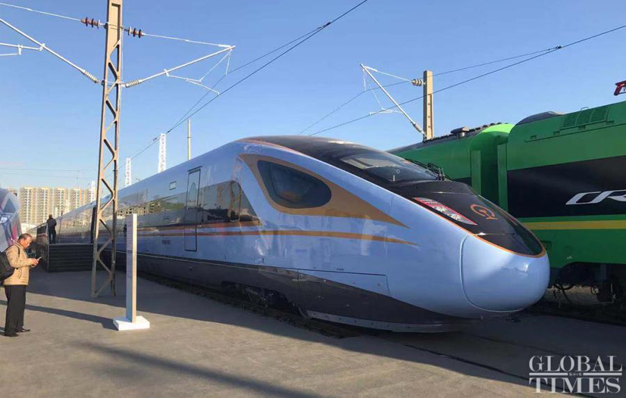 The new Fuxing bullet train CR300BF, also known as Rejuvenation, has a maximum speed of 250 km/h and eight coaches. It debuted on Monday at a testing field for China Railway Corp in Beijing\'s Chaoyang District. (Photos: Li Xuanmin/GT)