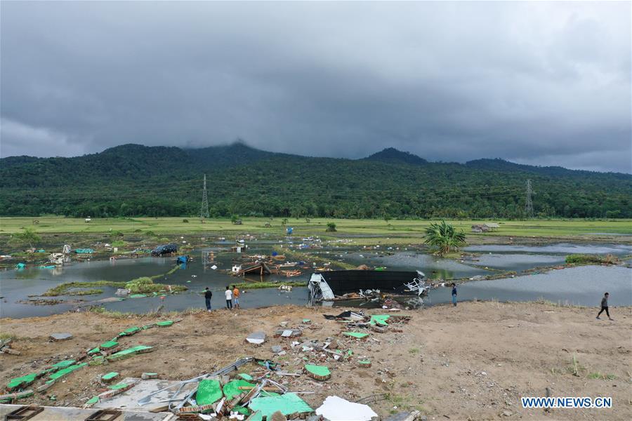 A farm machine is damaged by tsunami in Banten Province, in Indonesia, Dec. 24, 2018. The Indonesian disaster agency on Monday put the death toll of the tsunami triggered by a volcanic eruption at 373 with 1,459 others injured, a spokesman of the agency told Xinhua on Monday. (Xinhua/Du Yu)