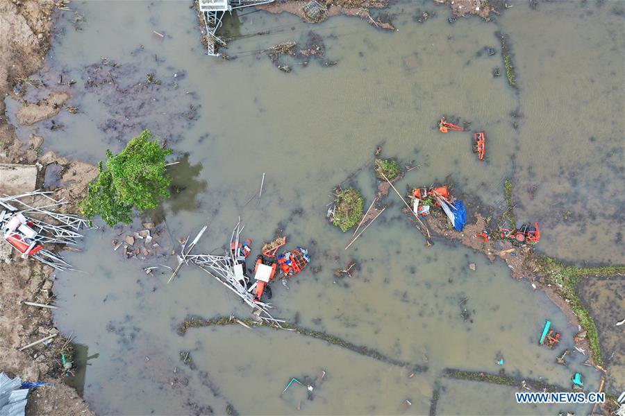 Aerial photo taken on Dec. 24, 2018 shows a farmland damaged by tsunami in Banten Province, in Indonesia, Dec. 24, 2018. The Indonesian disaster agency on Monday put the death toll of the tsunami triggered by a volcanic eruption at 373 with 1,459 others injured, a spokesman of the agency told Xinhua on Monday. (Xinhua/Du Yu)