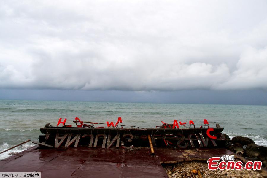 Remaining parts of an outdoor stage, where a rock band Seventeen was performing, which was hit by a tsunami, lay on a shore at a resort in Tanjung Lesung, Banten province, Indonesia, Dec. 24, 2018. Indonesian military and rescue teams fanned out across a stretch of coastline on Monday, hoping to find survivors of a tsunami triggered by a landslide from a volcano that killed at least 373 people. (Photo/Agencies)