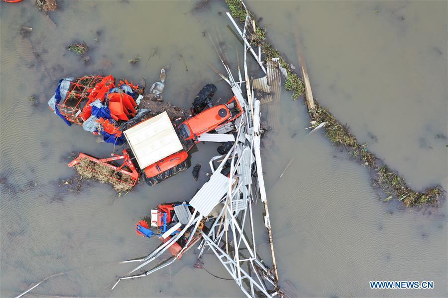 A farm machine is damaged by tsunami in Banten Province, in Indonesia, Dec. 24, 2018. The Indonesian disaster agency on Monday put the death toll of the tsunami triggered by a volcanic eruption at 373 with 1,459 others injured, a spokesman of the agency told Xinhua on Monday. (Xinhua/Du Yu)