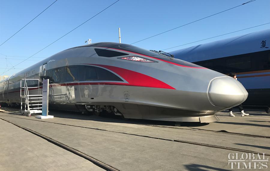 It can carry 1,823 passengers, making it 7.5 percent larger than the current Fuxing train\'s capacity. The new train will be put into service on rail lines between Beijing and Shanghai in January. (Photos: Li Xuanmin/GT)