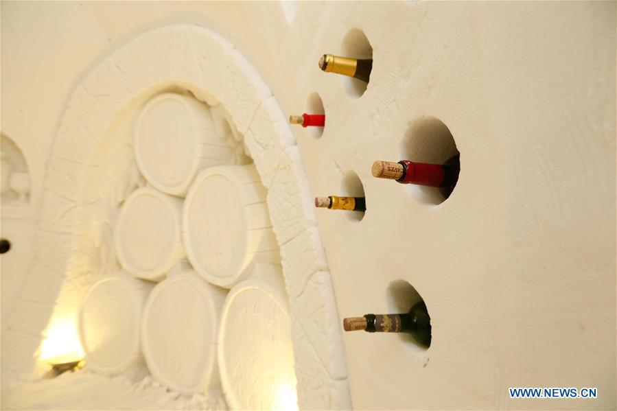 Photo taken on Dec. 25, 2018 shows the interior of an ice and snow hotel in Hailar of Hulun Buir, north China\'s Inner Mongolia Autonomous Region. The hotel, made from 8,000 tons of ice and snow, attracts many tourists. (Xinhua/Yu Dongsheng)