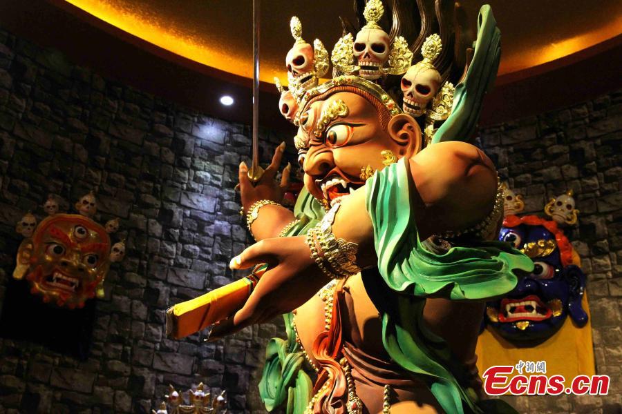A folk artist creates a clay sculpture in Regong, Tongren County, Huangnan Tibetan Autonomous Prefecture, Qinghai Province, Dec. 25, 2018. Buddhist monks and folk artists carry on the plastic arts of painting thangka and murals, crafting patchwork barbola and sculpting known collectively as the Regong arts, inscribed on the representative list of the UNESCO Intangible Cultural Heritage of Humanity. (Photo: China News Service/Zhang Tianfu)