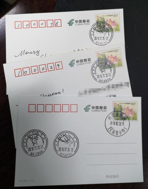 Tourists can send postcards with unique postmarks of reindeer patterns. (Photo/China Daily)