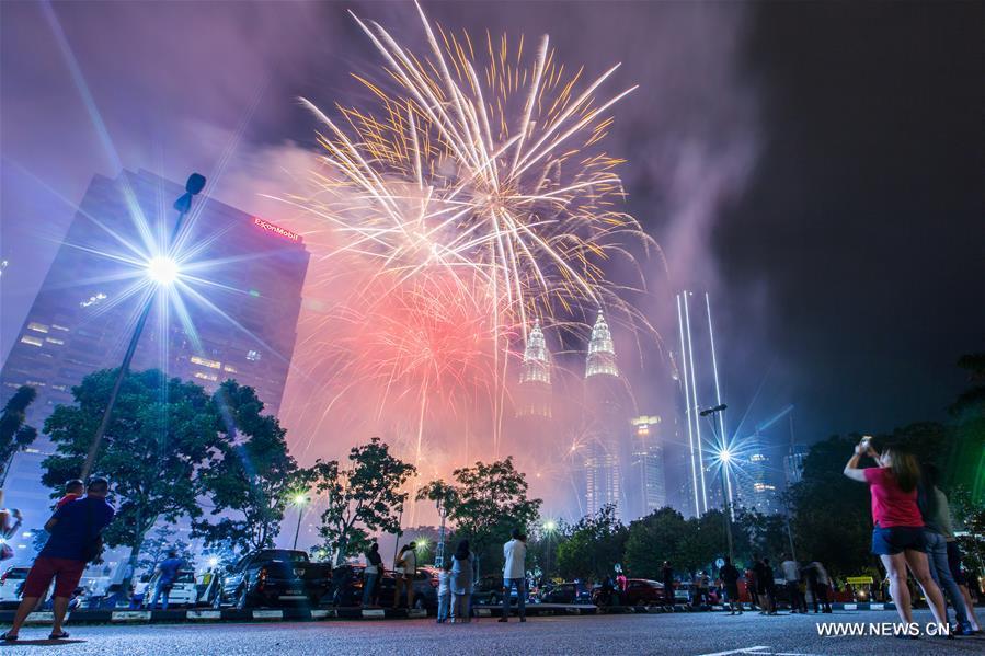 New Year fireworks are seen near the Petronas Twin Towers in Kuala Lumpur, Malaysia, on Jan. 1, 2019. (Xinhua/Zhu Wei)