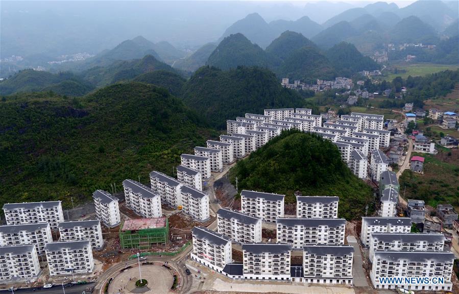 Aerial photo taken on Oct. 15, 2018 shows a view of the Songping settlement for poverty relief relocation in Shadaogou Town of Xuan\'en County, central China\'s Hubei Province. The 18th Central Committee of the Communist Party of China (CPC) held the third plenary session in November, 2013. In the five years since then, China\'s reform momentum had been particularly strong as the CPC decided to advance reform in all aspects during the meeting. Since the third plenary session, Chinese President Xi Jinping has presided over at least 45 high-profile meetings on advancing reforms, during which 400 documents and 1,932 reform plans have been launched. As a result, China\'s reform has been expanded from the economic field to a broad sphere including administrative management, culture, society, ecological conservation, Party building, and the military. (Xinhua/Song Wen)
