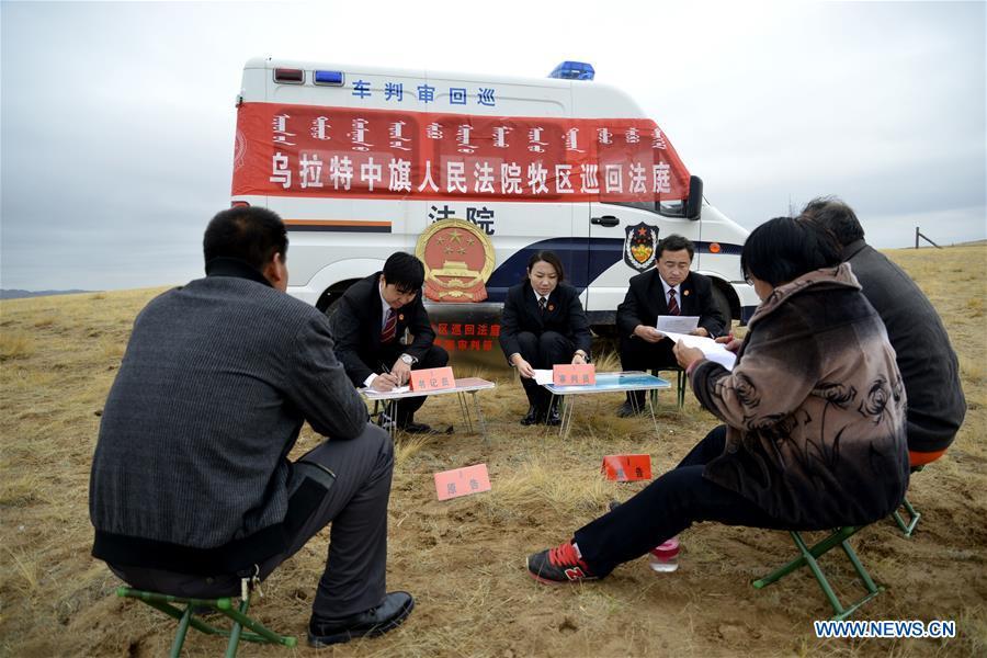 The circuit court for the pastoral areas of Urad Middle Banner mediates a civil dispute in Urad Middle Banner, north China\'s Inner Mongolia Autonomous Region, Oct. 30, 2014. The 18th Central Committee of the Communist Party of China (CPC) held the third plenary session in November, 2013. In the five years since then, China\'s reform momentum had been particularly strong as the CPC decided to advance reform in all aspects during the meeting. Since the third plenary session, Chinese President Xi Jinping has presided over at least 45 high-profile meetings on advancing reforms, during which 400 documents and 1,932 reform plans have been launched. As a result, China\'s reform has been expanded from the economic field to a broad sphere including administrative management, culture, society, ecological conservation, Party building, and the military. (Xinhua/Zhi Maosheng)