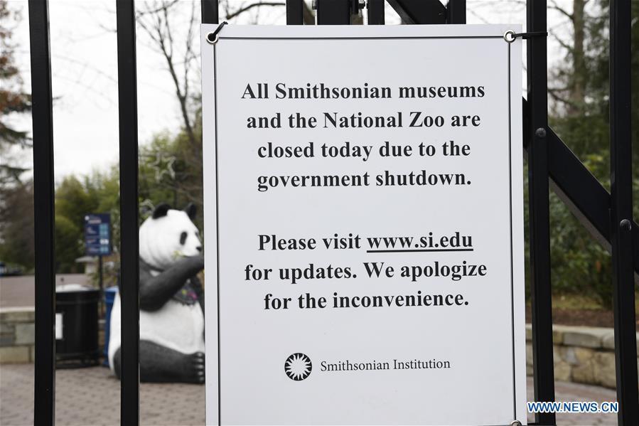 Photo taken on Jan. 2, 2019 shows a notice of closure on the gate of the National Zoo in Washington D.C., the United States. The 19 Smithsonian museums and the National Zoo in Washington D.C. closed their doors on Wednesday as the partial U.S. government shutdown dragged on. (Xinhua/Liu Jie)