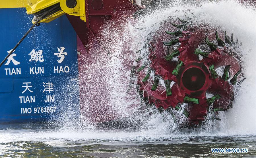 Chinese-built dredging vessel Tian Kun Hao conducts dredging work on Oct. 19, 2018. Tian Kun Hao, a Chinese-built dredging vessel, which is the largest of its kind in Asia, returned to the shipyard Wednesday after completing its sea trial of nearly three months. The 140-meter-long, 27.8-meter-wide vessel can dig as deep as 35 meters under the sea floor and dredge 6,000 cubic meters per hour, according to its investor, Tianjin Dredging Co., a subsidiary of China Communication Construction Co. (Xinhua)