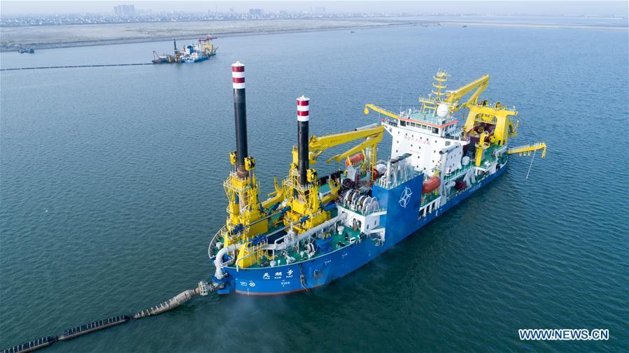 Chinese-built dredging vessel Tian Kun Hao conducts dredging work on Oct. 19, 2018. Tian Kun Hao, a Chinese-built dredging vessel, which is the largest of its kind in Asia, returned to the shipyard Wednesday after completing its sea trial of nearly three months. The 140-meter-long, 27.8-meter-wide vessel can dig as deep as 35 meters under the sea floor and dredge 6,000 cubic meters per hour, according to its investor, Tianjin Dredging Co., a subsidiary of China Communication Construction Co. (Xinhua)