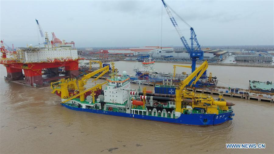 Chinese-built dredging vessel Tian Kun Hao is moored at the shipyard after completing its sea trial on Jan. 9, 2019. Tian Kun Hao, a Chinese-built dredging vessel, which is the largest of its kind in Asia, returned to the shipyard Wednesday after completing its sea trial of nearly three months. The 140-meter-long, 27.8-meter-wide vessel can dig as deep as 35 meters under the sea floor and dredge 6,000 cubic meters per hour, according to its investor, Tianjin Dredging Co., a subsidiary of China Communication Construction Co. (Xinhua)