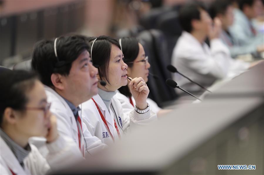 Technicians work at the Beijing Aerospace Control Center (BACC) in Beijing, capital of China, Jan. 11, 2019. China announced Friday that the Chang\'e-4 mission, which realized the first-ever soft-landing on the far side of the moon, was a complete success. (Xinhua/Jin Liwang)