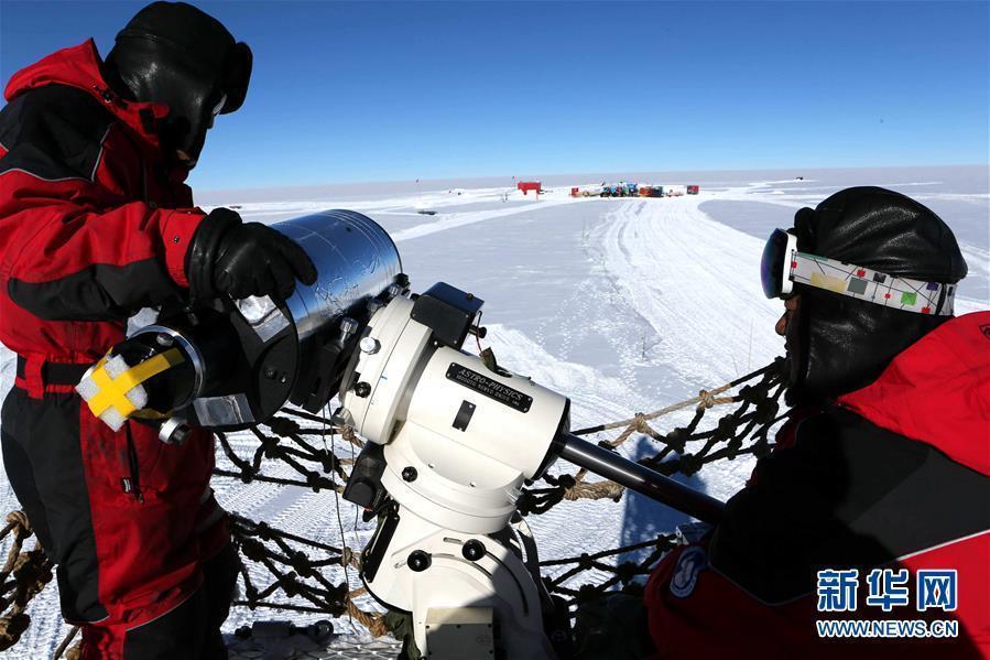 Members of China\'s 35th Antarctic scientific expedition team install and test the KL-DIMM telescope for Kunlun Station at Dome A, Antarctica, Jan. 16, 2019. (Photo/Xinhua)