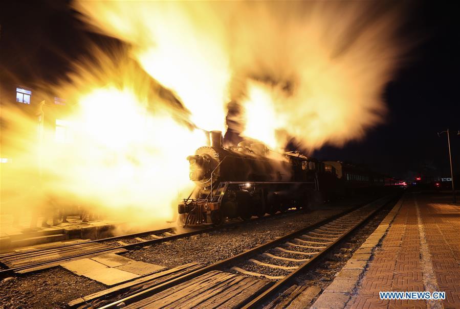 Photo taken on Jan. 17, 2019 shows a steam locomotive at the Diaobingshan Station, northeast China\'s Liaoning Province. A 5-day steam locomotive tourism event kicked off in Diaobingshan on Thursday. Tourists can visit the steam locomotive museum, take pictures of steam locomotives and watch exhibitions during the event. (Xinhua/Pan Yulong)