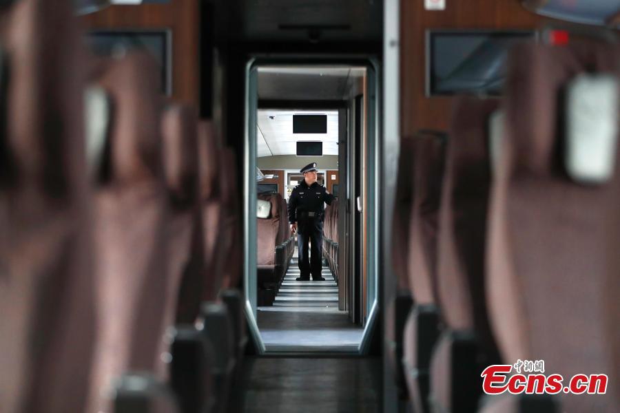 A police dog is seen completing a safety patrol at a bullet train service station in Beijing, Jan. 17, 2019. Beijing police have increased security checks on trains at the service station for routine inspections and maintenance as the Spring Festival travel rush approaches. (Photo: China News Service/Fu Tian)