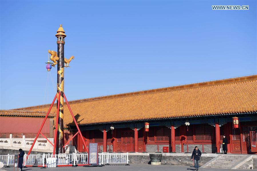 A heavenly lantern is installed before the Qianqing Gong, or the Palace of Heavenly Purity, at the Palace Museum, also known as the Forbidden City, in Beijing, capital of China, Jan. 21, 2019. The traditional lanterns recovered by the Palace Museum in accordance with historical archives from the Qing Dynasty (1644-1911) are opened to the public Monday, as a part of the exhibition of \