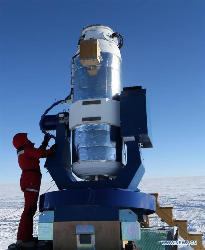 A member of China\'s 35th Antarctic expedition team checks the AST3-2 telescope at the Kunlun Station in Antarctica, Jan. 23, 2019. The Kunlun team of China\'s 35th Antarctic expedition withdrew from the Kunlun Station on Thursday after completing various scientific exploration projects at the peak of Antarctic\'s inland icecap. (Xinhua/Liu Shiping)