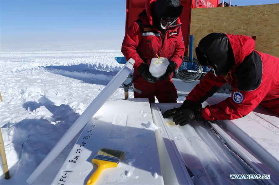 Members of China\'s 35th Antarctic expedition team package the samples of ice and snow at the Kunlun Station in Antarctica, Jan. 22, 2019. The Kunlun team of China\'s 35th Antarctic expedition withdrew from the Kunlun Station on Thursday after completing various scientific exploration projects at the peak of Antarctic\'s inland icecap. (Xinhua/Liu Shiping)