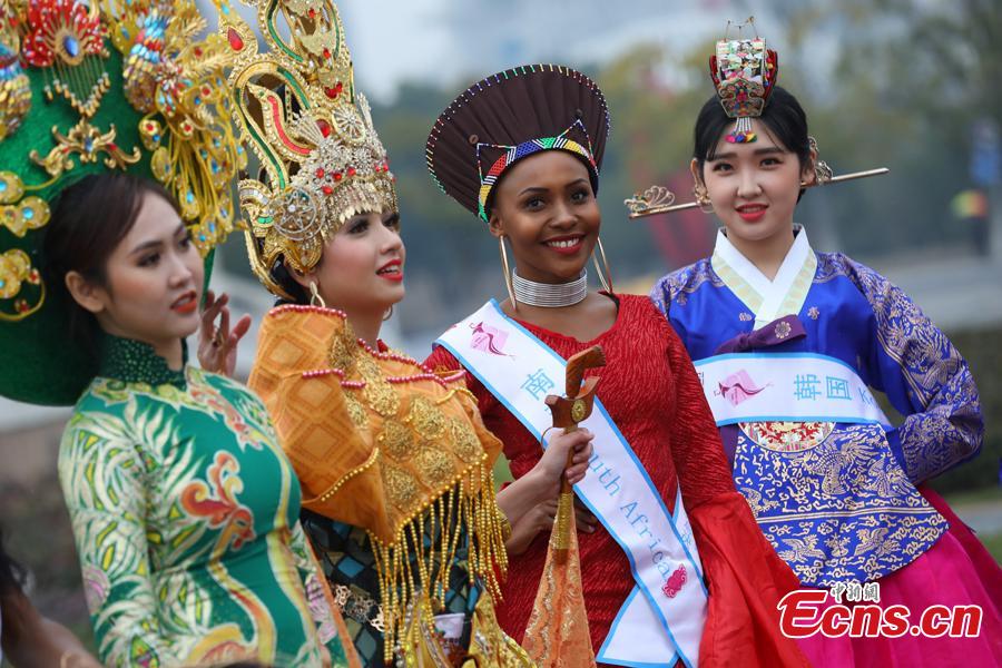 Contestants of the 53rd Miss All Nations Pageant brave the winter chill to pose for a photo in Nanjing, east China\'s Jiangsu Province, Jan. 28, 2019. The pageant will be held on Jan. 29 to promote Eco-Tourism. (Photo: China News Service/Yang Bo)