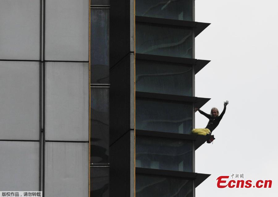 French urban climber Alain Robert stages his first climb in the Philippines as he scales a 43-floor skyscraper in Makati City, Manila, the Philippines, Jan. 29, 2019. (Photo/Agencies)