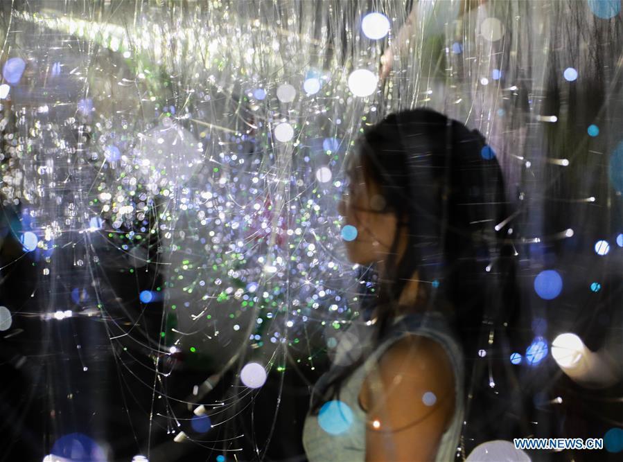 A visitor views a light installation during the Bangkok Design Week 2019 in Bangkok, Thailand, Jan. 30, 2019. The Bangkok Design Week 2019 was held under the theme \