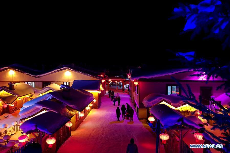 Photo taken with a mobile phone shows the night view of Shuangfeng Forest Farm in Mudanjiang City, northeast China\'s Heilongjiang Province, Jan. 30, 2019. The Shuangfeng Forest Farm witnesses frequent snowfalls and is covered with snow for most of the year. The beautiful snow scenery here attracts many visitors from at home and abroad every year. (Xinhua/Yang Siqi)