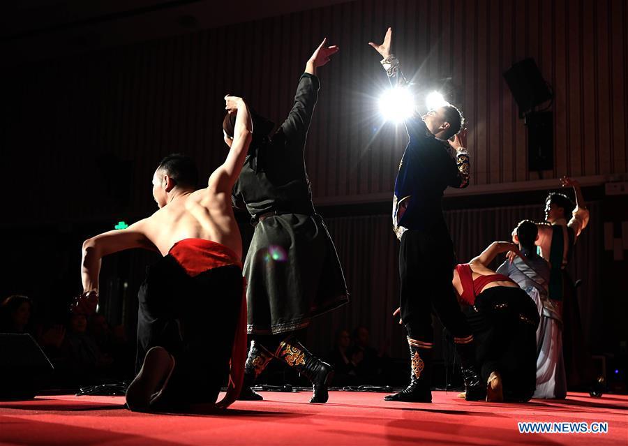Performers dance during a gala held by Confucius Institute Bonn and China Institute of Minority Nationality Dance to celebrate the upcoming Spring Festival, or the Chinese Lunar New Year, in Bonn, Germany, on Jan. 31, 2019.(Xinhua/Lu Yang)