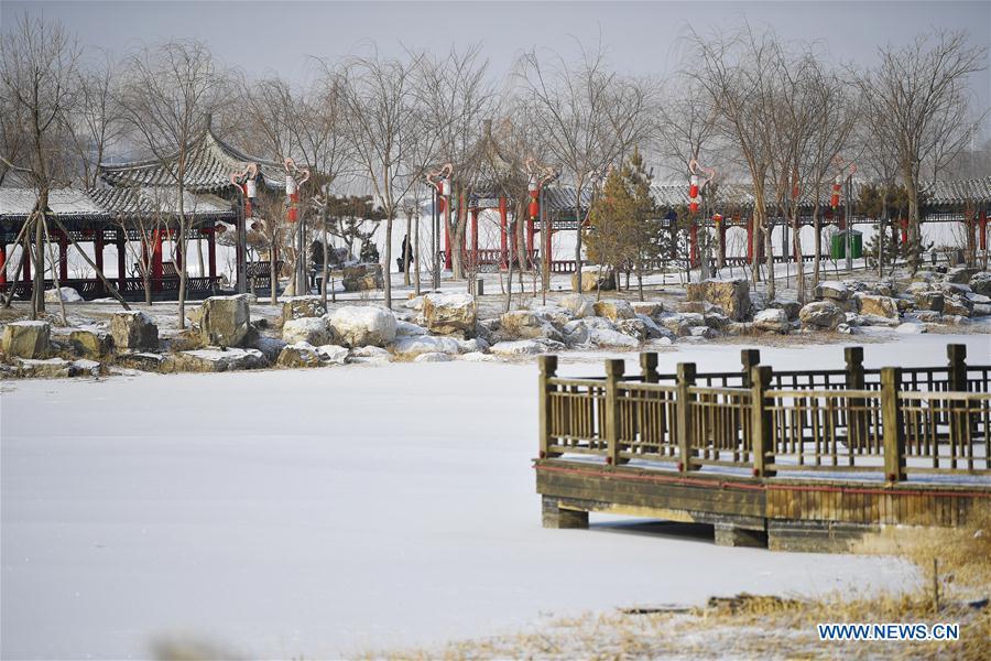Photo taken on Jan. 31, 2019 shows the snow scenery of Yuehaiwan business district in Yinchuan, capital of northwest China\'s Ningxia Hui Autonomous Region. (Xinhua/Wang Peng)