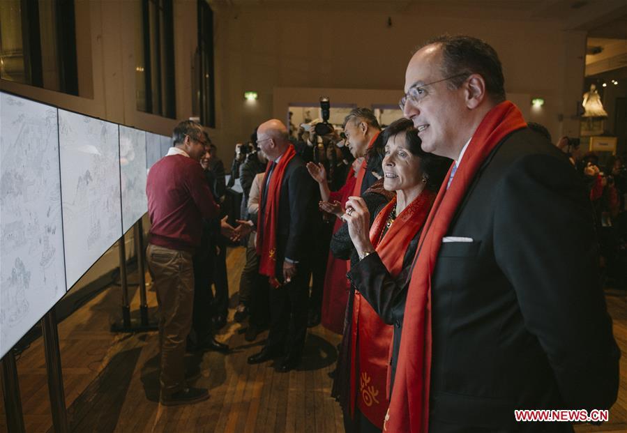Visitors admire an exhibition of \